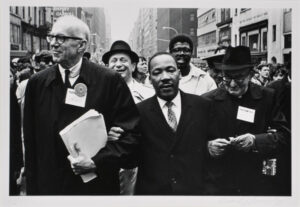 Dr. Benjamin Spock, Dr. Martin Luther King, Jr., and Monsignor Rice of Pittsburgh march in the Solidarity Day Parade at the United Nations Building