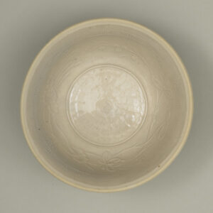 Bowl with Stamped Flower and Slip-Trailed Characters