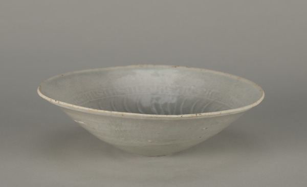 Bowl with Molded Flower at Center and Wavy Lines on Inside - Image 2