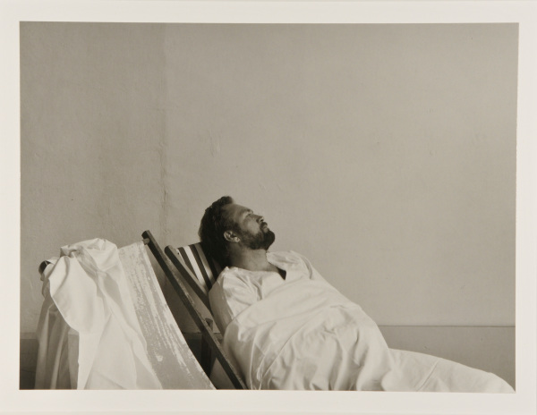 Figure Seated in Striped Lawn Chair - Image 4