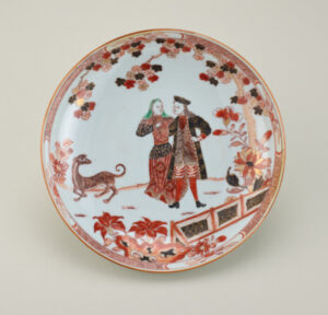 Dutch Market Deep Dish Decorated with European Figures and Dog in a Garden
