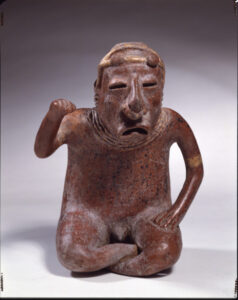 Seated male figure