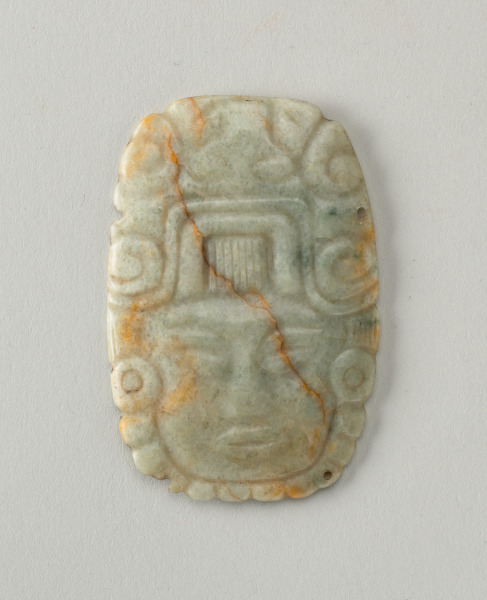 Pendant with face