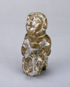 Male Figure Riding an Elephant