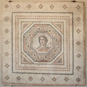 Fragment of floor mosaic depicting a male figure