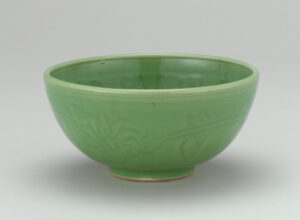 Bowl with Molded Decoration of Figures and Inscriptions