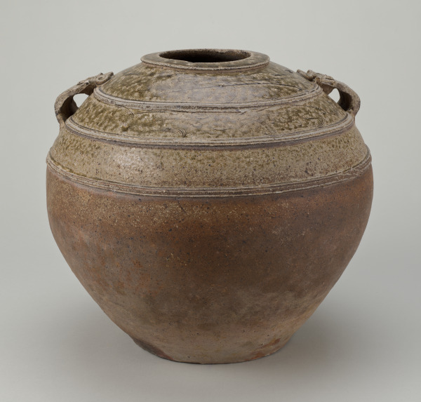 Storage Vessel with Incised Scroll Design and Mask Handles - Image 3