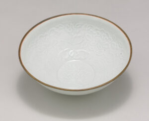 Qingbai Bowl with Molded Peony Design