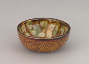 Small Bowl with Molded Persian-Style Leafy Vine Design