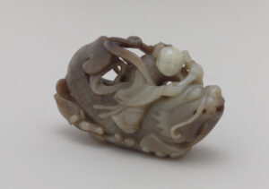 Boy on a Creature with a Carp’s Body and a Dragon’s Head