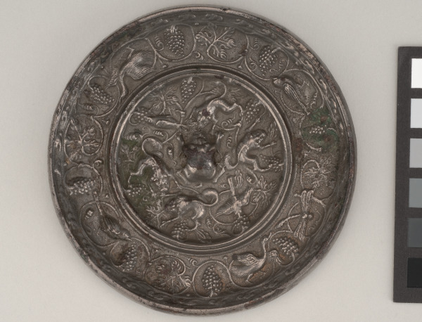Mirror Decorated with Lion-and-Grape Motif