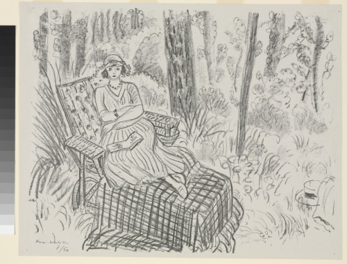 YOUNG GIRL ON A CHAISE LONGUE IN A FOREST