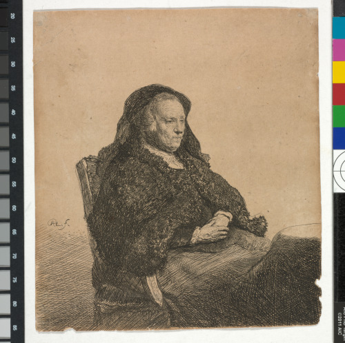 THE ARTIST'S MOTHER SEATED AT A TABLE, LOOKING RIGHT: THREE QUARTER LENGTH