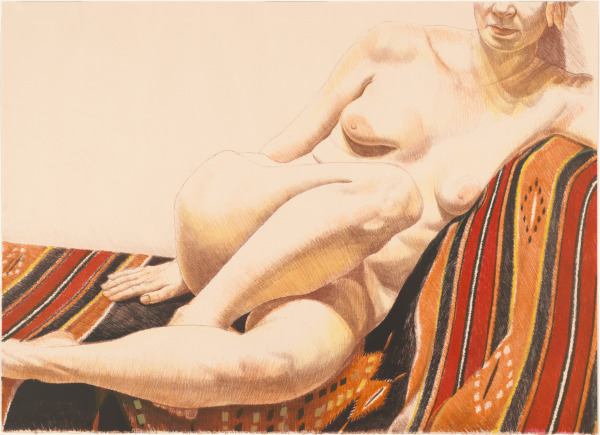 Girl on Orange and Black Mexican Rug - Image 2