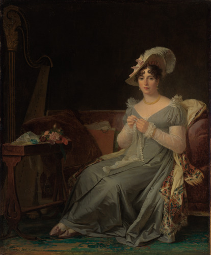 Young Woman Embroidering - Image 1