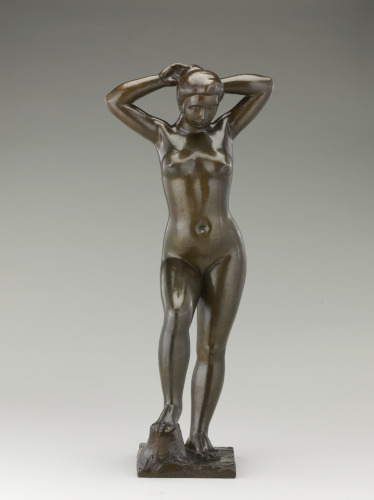 BATHER FIXING HER HAIR