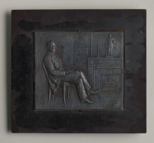 “Scene of a Man Seated Before a Fireplace” Plaquette