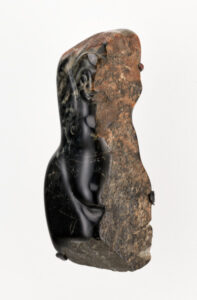 Female Form Embedded in Stone