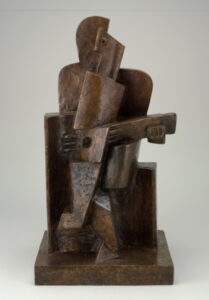 Seated Guitar Player