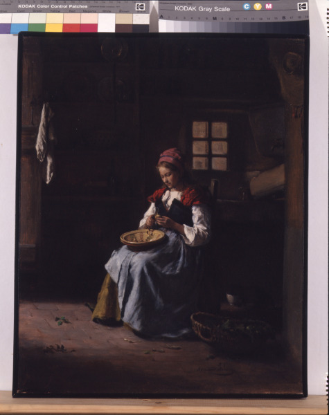Woman Peeling Vegetables