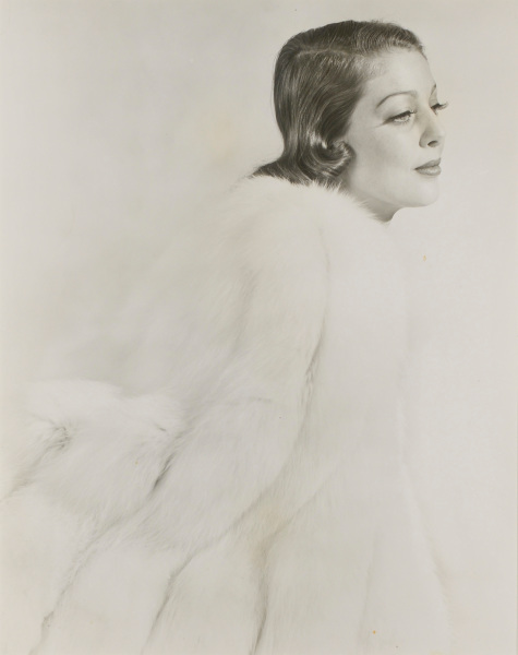 Woman in a White Fur Coat - Image 2