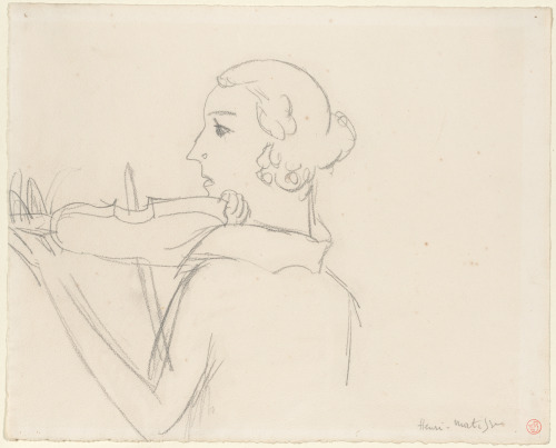 WOMAN PLAYING A VIOLIN