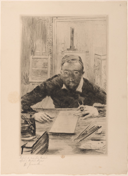 NORBERT GOENEUTTE IN FRONT OF HIS WORKTABLE