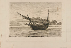 Un bateau de pêche tiré sur le sable