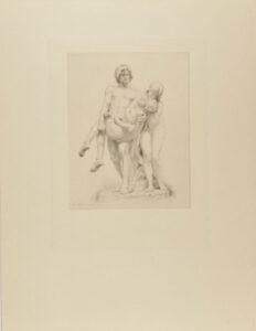Man and woman holding a young boy
