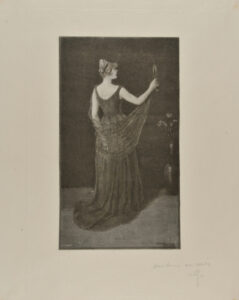 (Woman holding a mirror, seen from behind)