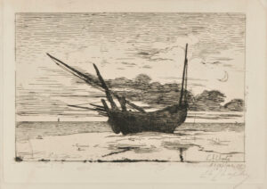 Un bateau de pêche tiré sur le sable