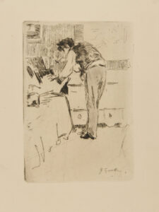 Henri Guérard consultant un carton d’estampes