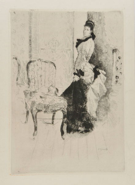 WOMAN STANDING IN AN INTERIOR