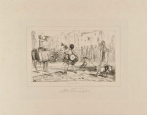 Travelling performer with monkeys and dogs in a town center