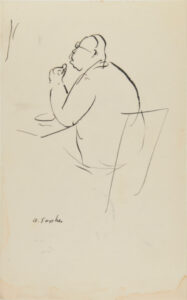 Man Sitting at Table