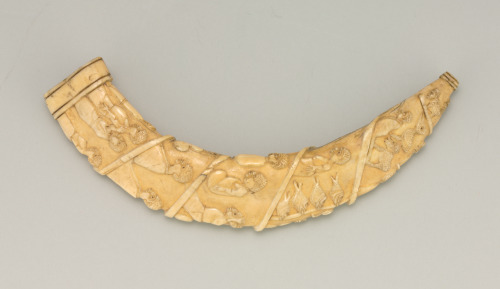 Tusk Carved in Relief