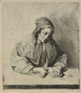 Woman Counting Money at a Table