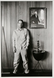 Inmate outside warden’s office, about to be transferred by local authorities, Ellis