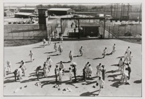 Return from the fields, shakedown at the rear gate. Twice every work day, Ellis