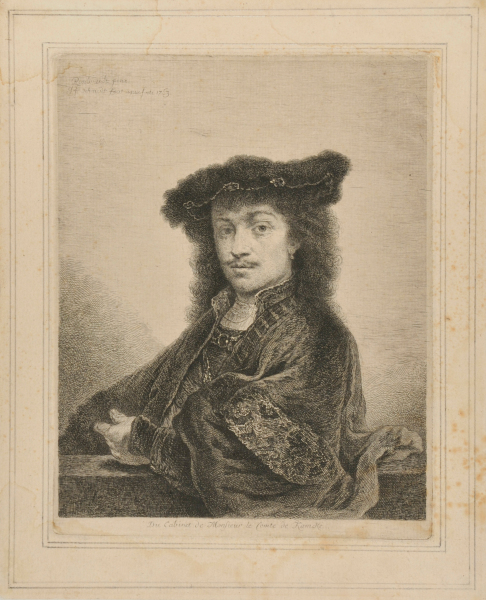 PORTRAIT OF A YOUNG MAN WEARING A FLAT CAP