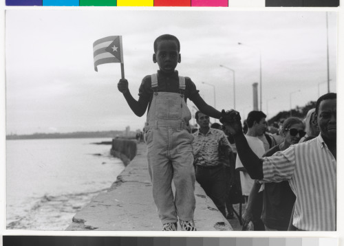 BOY WAVING FLAG