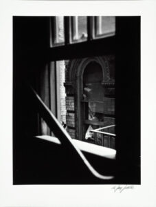 Woman Looking out of Window