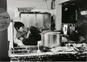 Boy in Kitchen Watching TV