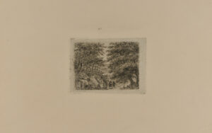 Two people walking in woods