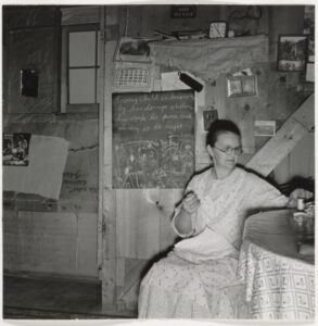 Mrs. Hull in One-Room Dugout Basement Home, Dead Ox Flat, Malheur County, Oregon