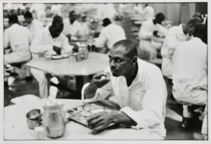 Convict in prison twenty calendar years, life sentence. Speaking is forbidden in the dining room, Ellis