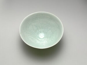 Qingbai Bowl with Design of Boys within Floral Scrolls