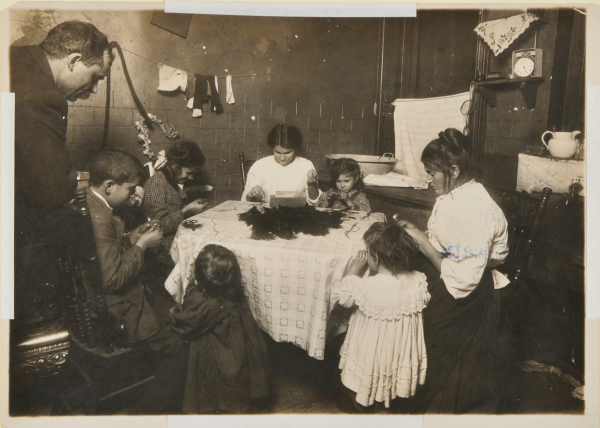 Father Hanging Around the Home While Family Works on Feathers - Image 3