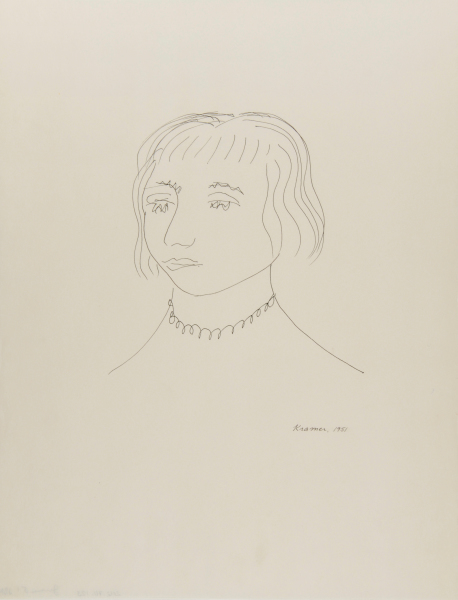 WOMAN WEARING A NECKLACE