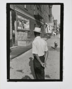 Man with Hat and Kool Advertisement, New York